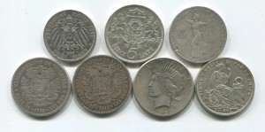 крупное серебро 7 монет разные