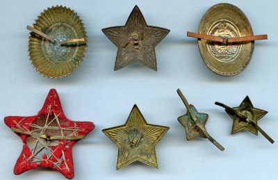 Старые звезды и кокарды МВД.