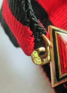 Знак ордена Св. Владимира 4-й степени, на орденской ленте.