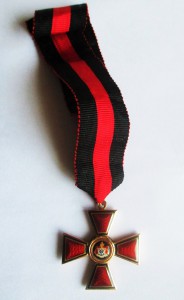 Знак ордена Св. Владимира 4-й степени, на орденской ленте.