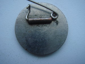 Китайский значок.