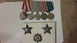 четыри ордена +четыри боевые медали на одного
