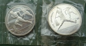 Комплект монет олимпиада в Барселоне 1992г в упаковках.