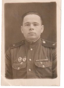 артиллерист со знаком Отл. минометчик