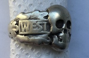 Перстень  " череп"  WEST WALL в серебре и бронзе