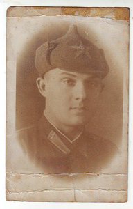 Летчик в буденовке,1936 год ( три фото)