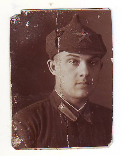 Летчик в буденовке,1936 год ( три фото)