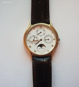 Золотые  часы Carl F. Bucherer