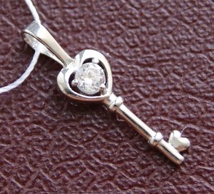 Подвеска " ключик ", родированное серебро 925 пр. c ярлыком.