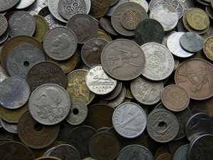 Продаю иностранные монеты на вес от 1 кг.