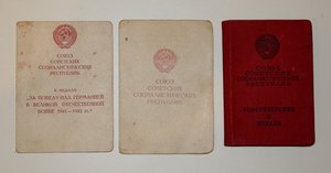 Служебное удостоверение ОГПУ 1934г. и документы на 3 медали