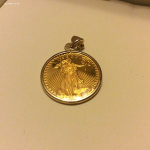 25 долларов. 999 проба. 1/10 унции. Либерия.