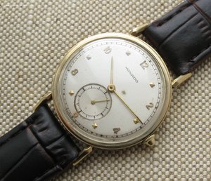 MOVADO МОВАДО, золото 585 проба , Швейцария