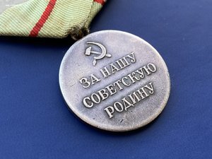 Медаль партизану отечественной войны 1 степени.
