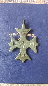 Крестик, помогите определить.