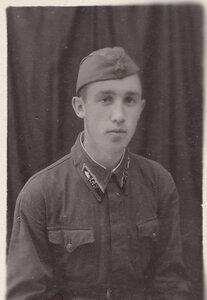 Курсант ЛАУ. Эмблемы танковых войск. 1941 год.