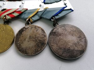 Группа из 8 медалей, три номерных