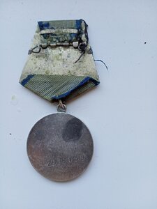 Медаль за Отвагу.