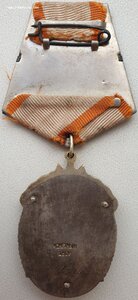 Знак Почёта № 34.374 с определением. 1943 год. Вручён в Баку