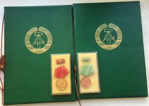 Две медали МВД ГДР с грамотами на лейтенанта полиции