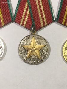 XX;XV;X лет выслуги КГБ.