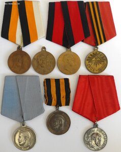 7 Медалей. (4 медали в бронзе и 3 в серебре). Ленты.
