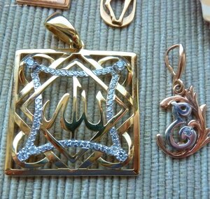 Подвески разные золото 585 .