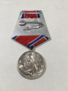 За отвагу на пожаре с доком (подп. команд. Воен.округом).