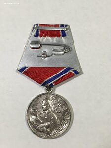 За отвагу на пожаре.