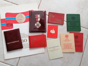 9 грамот и удостоверений СССР, одна медаль