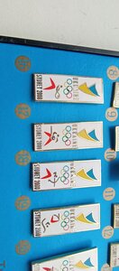 Набор знаков ( 23 и штуки )  в коробе олимпиада 2000 года