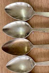 Серебряные кофейные ложки в эмалях.