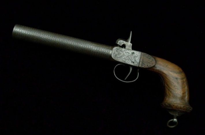 Капсульный пистолет