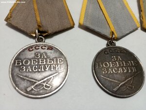 Три медали за боевые заслуги