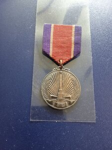Серебряная медаль За освобождение Кореи с доком.
