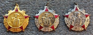Комплект орденов 1, 2, 3 степени Шахтёрская Слава КНДР