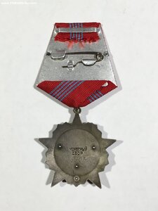 орден Октябрьской Революции № 9907.