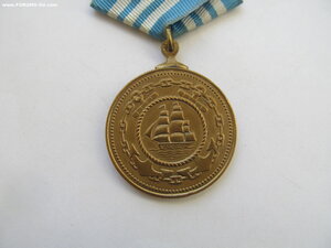 Медаль Нахимова № 5706 за сбитый самолет.