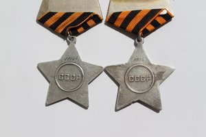 Две вторые,боевые Славы.28734 и 8954.