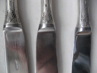 Три столовых ножа. Ручки серебро. 875* Киев.