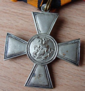 Колодка с георгиевским крестом и медалями.