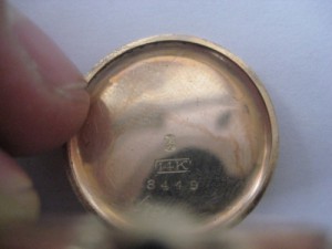 Часы золотые женские Швейцария клеймо 14К с белочкой