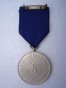 Медаль за 8 лет в полиции.